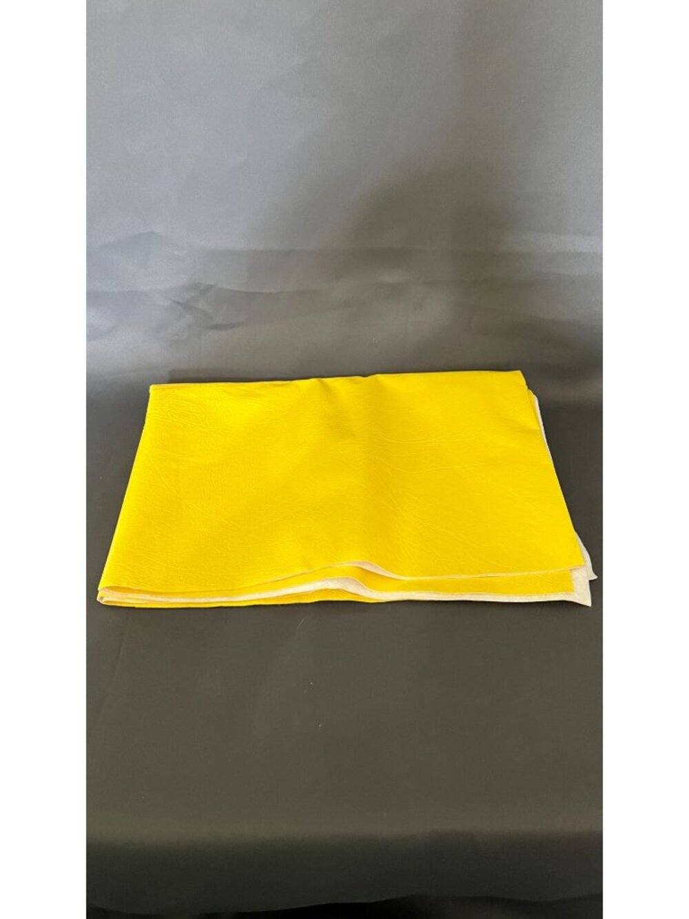 Bright Yellow Upholstery Vinyl Fabric With Soft Backing Folded